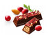 Two opened Almond & Cranberry Kit Kat Chocolate Bars alongside cranberries and almonds.