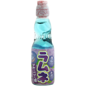Hatakousen Blueberry Ramune Soda in the classic codd-neck glass bottle. A delicious and refreshing Japanese drink! Available at Sweetie Kawaii!