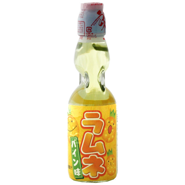 Hatakousen Pineapple Ramune Soda in the classic codd-neck glass bottle. A delicious and refreshing Japanese drink! Available at Sweetie Kawaii!