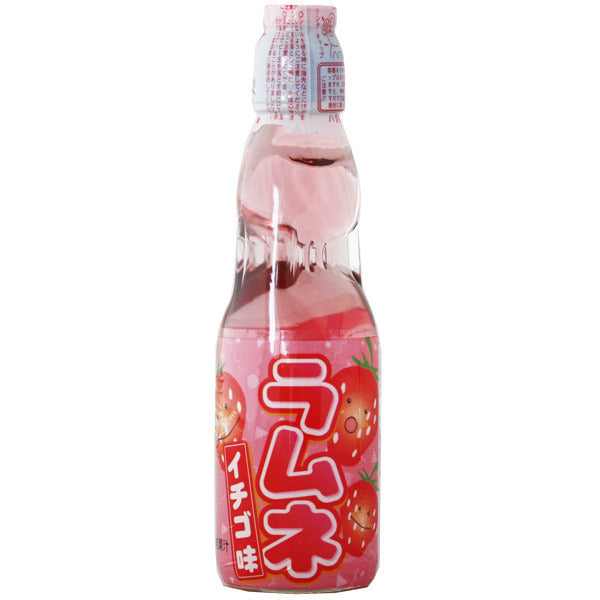 Hatakousen Strawberry Ramune Soda in the classic codd-neck glass bottle. A delicious and refreshing Japanese drink! Available at Sweetie Kawaii!